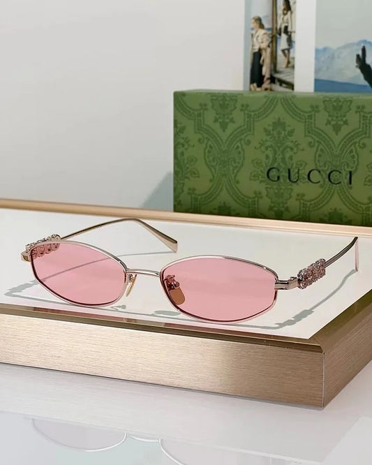 Gucci Logo embellished oval sunglasses